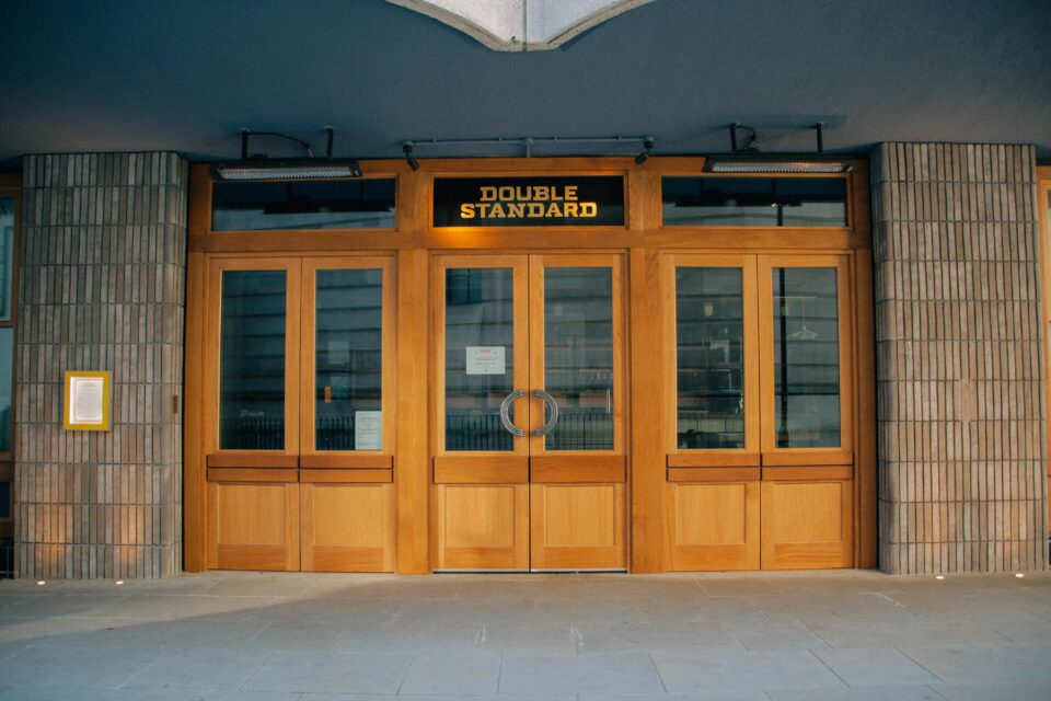 A boarded-up traditional British tavern illustrating the local environmental and waste challenges caused by frequent pub closures in Lancashire.