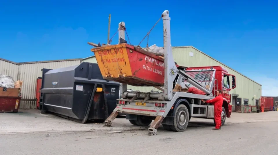 Flood preparation skip outside a Maghull home