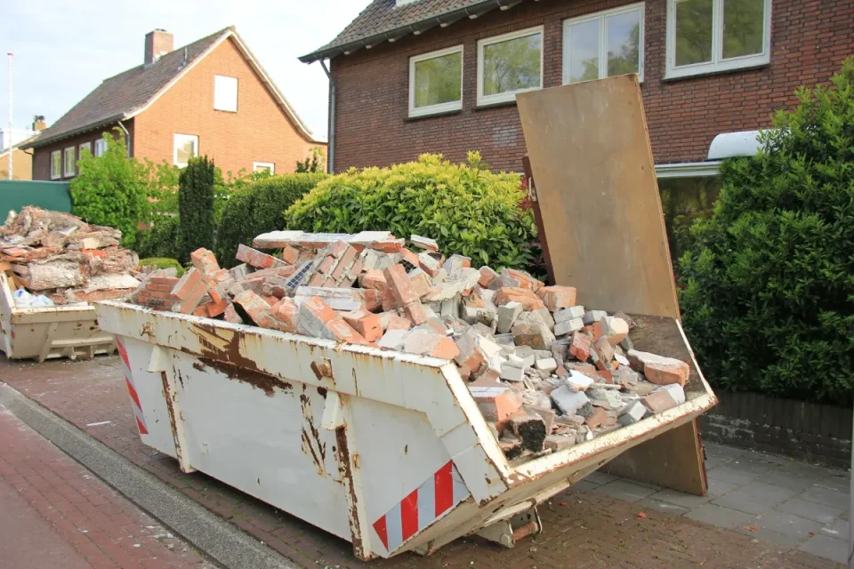 Log burner installation waste in a skip in Appley Bridge